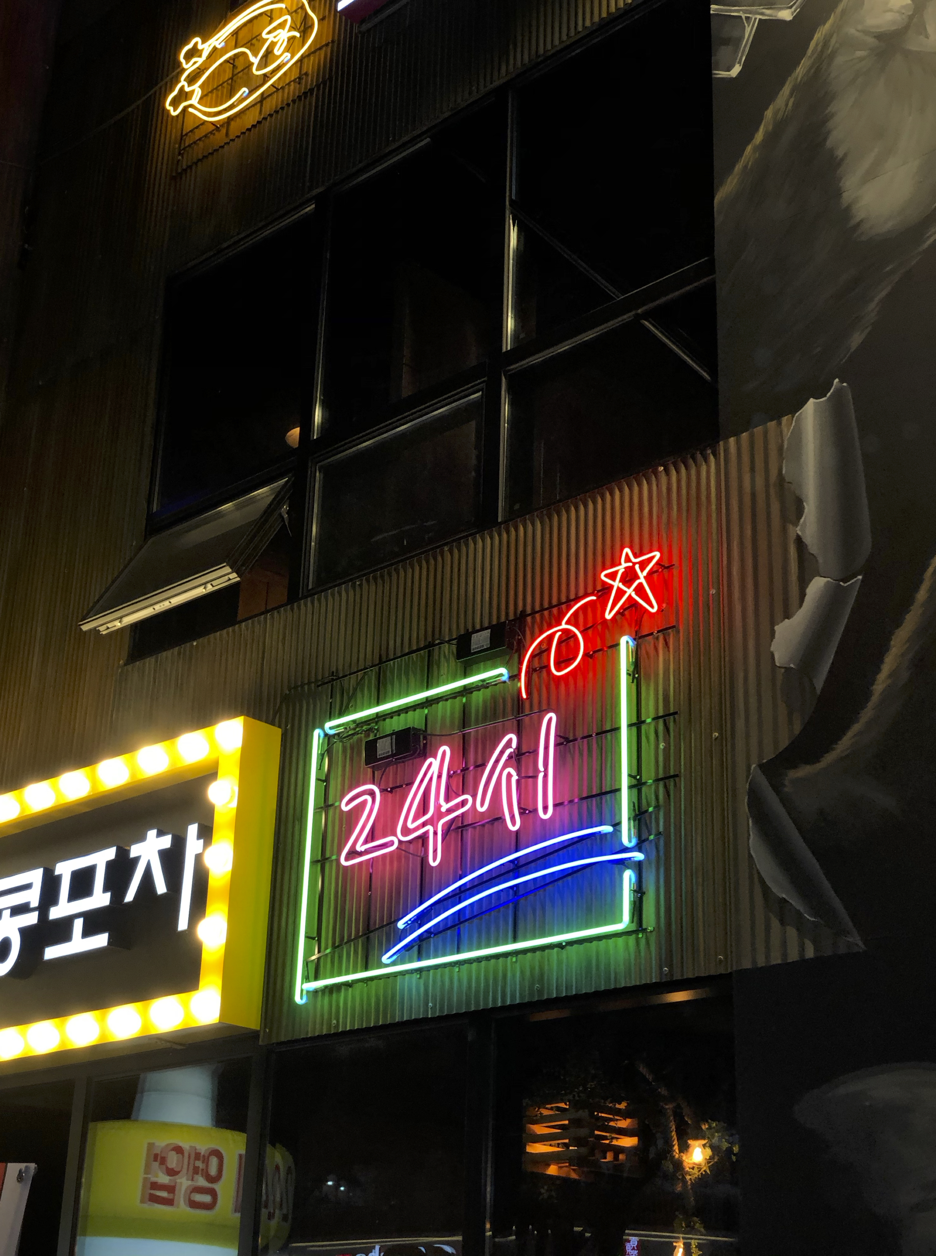 24hr restaurant with neon sign